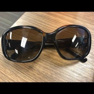 Prada polarized sunglasses with Prada Milano logo
